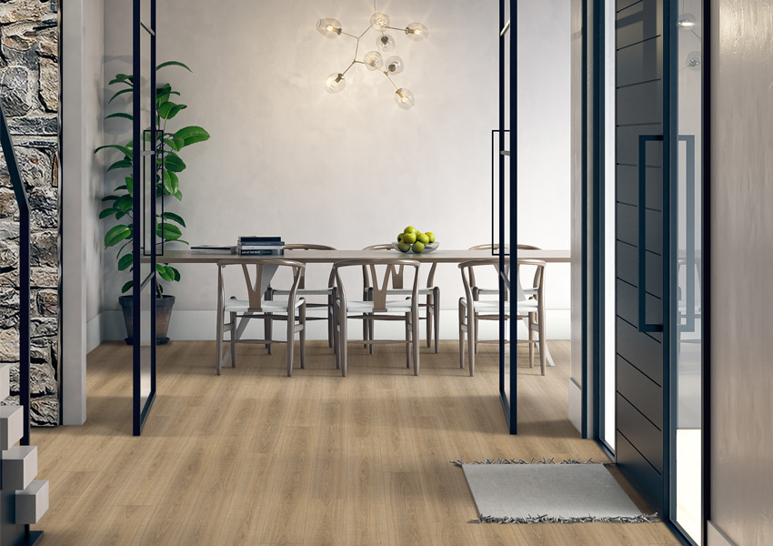 laminate flooring in entryway leading to dining room